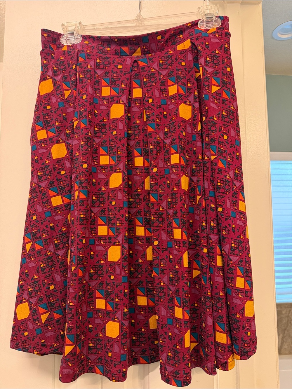 LuLaRoe Circle Skirt in Magenta with Yellow and Teal Geometric Print